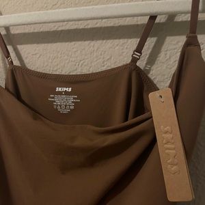 BRAND NEW SKIMS size M never worn